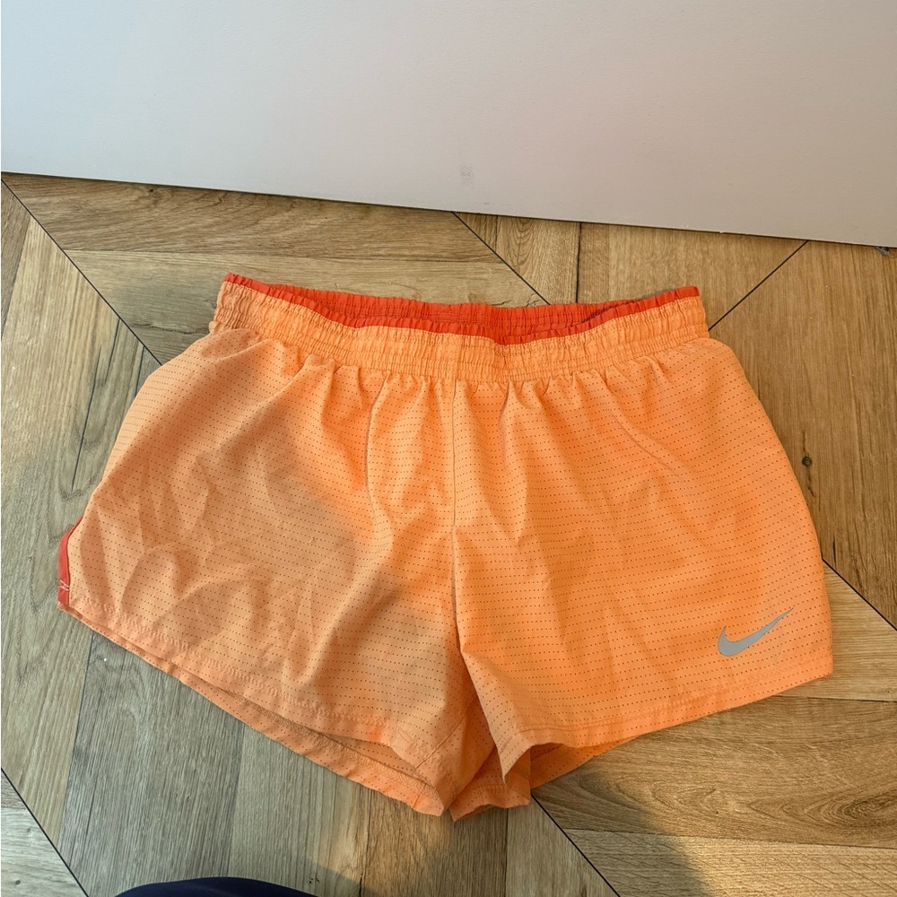 Nike Women's Vibrant Orange Athletic Shorts